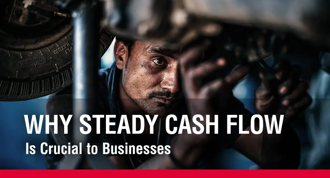 Manufacturing worker with text overlay why steady cash flow is crucial in business